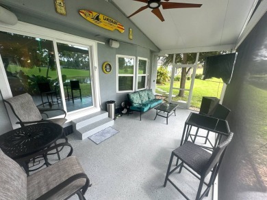 This completely remodeled, stucco Palm Harbor home is located on on Del Tura Golf and Country Club in Florida - for sale on GolfHomes.com, golf home, golf lot