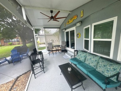 This completely remodeled, stucco Palm Harbor home is located on on Del Tura Golf and Country Club in Florida - for sale on GolfHomes.com, golf home, golf lot