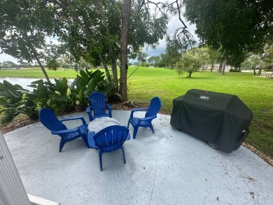 This completely remodeled, stucco Palm Harbor home is located on on Del Tura Golf and Country Club in Florida - for sale on GolfHomes.com, golf home, golf lot