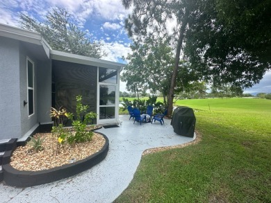 This completely remodeled, stucco Palm Harbor home is located on on Del Tura Golf and Country Club in Florida - for sale on GolfHomes.com, golf home, golf lot