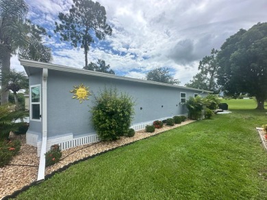 This completely remodeled, stucco Palm Harbor home is located on on Del Tura Golf and Country Club in Florida - for sale on GolfHomes.com, golf home, golf lot