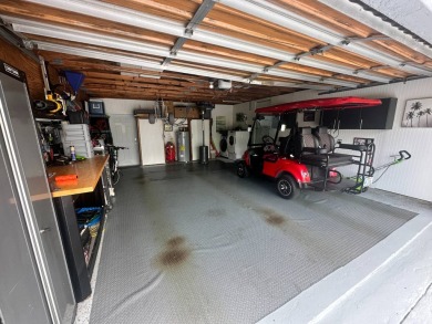 This completely remodeled, stucco Palm Harbor home is located on on Del Tura Golf and Country Club in Florida - for sale on GolfHomes.com, golf home, golf lot