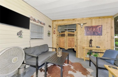 Located in the 55 +deed restricted Community of Holiday Park on Sabal Trace Golf and Country Club in Florida - for sale on GolfHomes.com, golf home, golf lot