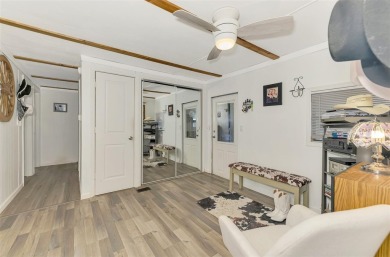 Located in the 55 +deed restricted Community of Holiday Park on Sabal Trace Golf and Country Club in Florida - for sale on GolfHomes.com, golf home, golf lot