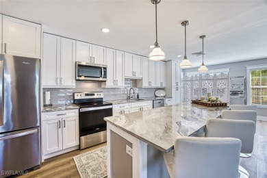 This stunning open concept/fully remodeled unit is bright with on Cypress Lake Country Club in Florida - for sale on GolfHomes.com, golf home, golf lot