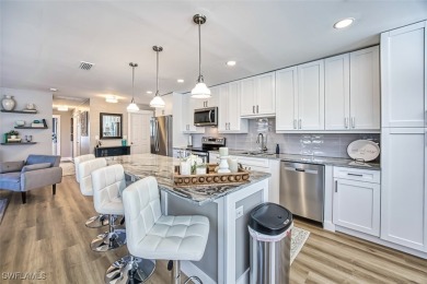 This stunning open concept/fully remodeled unit is bright with on Cypress Lake Country Club in Florida - for sale on GolfHomes.com, golf home, golf lot