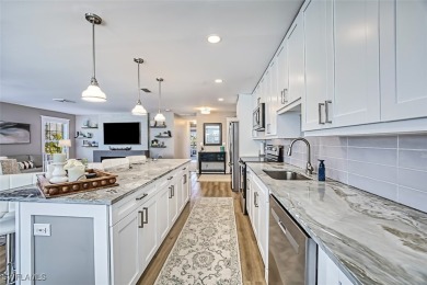 This stunning open concept/fully remodeled unit is bright with on Cypress Lake Country Club in Florida - for sale on GolfHomes.com, golf home, golf lot