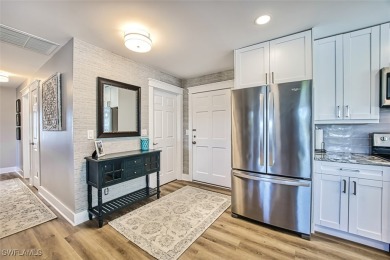 This stunning open concept/fully remodeled unit is bright with on Cypress Lake Country Club in Florida - for sale on GolfHomes.com, golf home, golf lot
