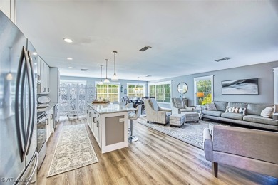 This stunning open concept/fully remodeled unit is bright with on Cypress Lake Country Club in Florida - for sale on GolfHomes.com, golf home, golf lot