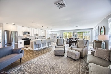 This stunning open concept/fully remodeled unit is bright with on Cypress Lake Country Club in Florida - for sale on GolfHomes.com, golf home, golf lot
