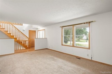 Expansive 2,184 sq. ft. home with a 1,456 sq. ft. basement and on West Shore Golf and Country Club in Michigan - for sale on GolfHomes.com, golf home, golf lot