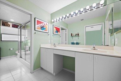 Experience tranquil waterfront living with elevated views in the on Jonathans Landing Golf Club in Florida - for sale on GolfHomes.com, golf home, golf lot