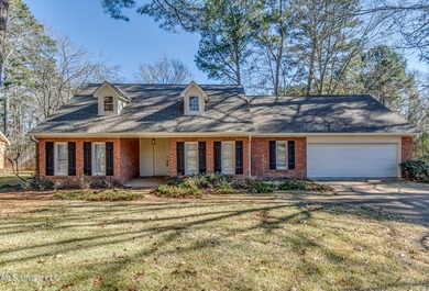 Discover this beautifully updated 3-bedroom, 2-bathroom home on Castlewoods Golf Club in Mississippi - for sale on GolfHomes.com, golf home, golf lot