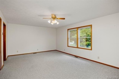Expansive 2,184 sq. ft. home with a 1,456 sq. ft. basement and on West Shore Golf and Country Club in Michigan - for sale on GolfHomes.com, golf home, golf lot