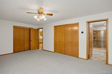 Expansive 2,184 sq. ft. home with a 1,456 sq. ft. basement and on West Shore Golf and Country Club in Michigan - for sale on GolfHomes.com, golf home, golf lot