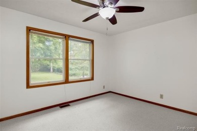 Expansive 2,184 sq. ft. home with a 1,456 sq. ft. basement and on West Shore Golf and Country Club in Michigan - for sale on GolfHomes.com, golf home, golf lot