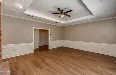 Discover this beautifully updated 3-bedroom, 2-bathroom home on Castlewoods Golf Club in Mississippi - for sale on GolfHomes.com, golf home, golf lot