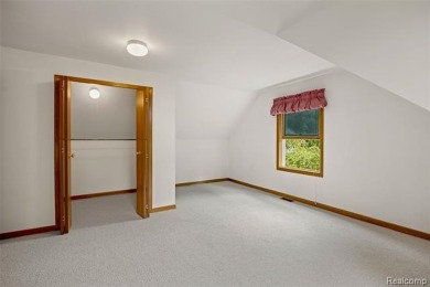 Expansive 2,184 sq. ft. home with a 1,456 sq. ft. basement and on West Shore Golf and Country Club in Michigan - for sale on GolfHomes.com, golf home, golf lot