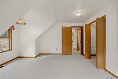 Expansive 2,184 sq. ft. home with a 1,456 sq. ft. basement and on West Shore Golf and Country Club in Michigan - for sale on GolfHomes.com, golf home, golf lot