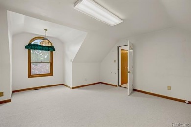 Expansive 2,184 sq. ft. home with a 1,456 sq. ft. basement and on West Shore Golf and Country Club in Michigan - for sale on GolfHomes.com, golf home, golf lot