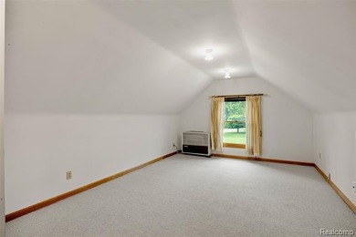 Expansive 2,184 sq. ft. home with a 1,456 sq. ft. basement and on West Shore Golf and Country Club in Michigan - for sale on GolfHomes.com, golf home, golf lot