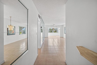 Make this bright and peaceful 2/2 CORNER UNIT, IMPACT WINDOWS on Leisureville Community Association in Florida - for sale on GolfHomes.com, golf home, golf lot