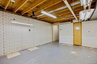 Expansive 2,184 sq. ft. home with a 1,456 sq. ft. basement and on West Shore Golf and Country Club in Michigan - for sale on GolfHomes.com, golf home, golf lot