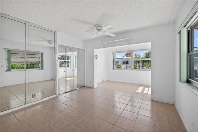 Make this bright and peaceful 2/2 CORNER UNIT, IMPACT WINDOWS on Leisureville Community Association in Florida - for sale on GolfHomes.com, golf home, golf lot