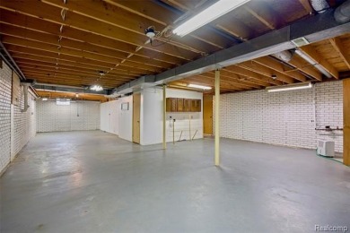 Expansive 2,184 sq. ft. home with a 1,456 sq. ft. basement and on West Shore Golf and Country Club in Michigan - for sale on GolfHomes.com, golf home, golf lot