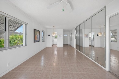 Make this bright and peaceful 2/2 CORNER UNIT, IMPACT WINDOWS on Leisureville Community Association in Florida - for sale on GolfHomes.com, golf home, golf lot