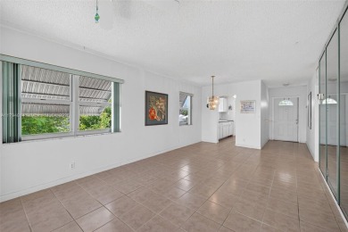 Make this bright and peaceful 2/2 CORNER UNIT, IMPACT WINDOWS on Leisureville Community Association in Florida - for sale on GolfHomes.com, golf home, golf lot