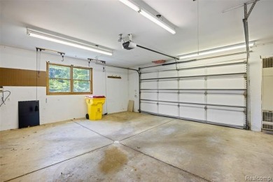 Expansive 2,184 sq. ft. home with a 1,456 sq. ft. basement and on West Shore Golf and Country Club in Michigan - for sale on GolfHomes.com, golf home, golf lot