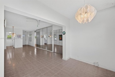 Make this bright and peaceful 2/2 CORNER UNIT, IMPACT WINDOWS on Leisureville Community Association in Florida - for sale on GolfHomes.com, golf home, golf lot