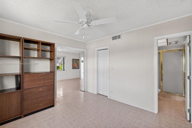Make this bright and peaceful 2/2 CORNER UNIT, IMPACT WINDOWS on Leisureville Community Association in Florida - for sale on GolfHomes.com, golf home, golf lot