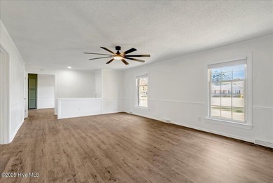 This isn't your average brick ranch - it's a beautifully on Falling Creek Country Club in North Carolina - for sale on GolfHomes.com, golf home, golf lot