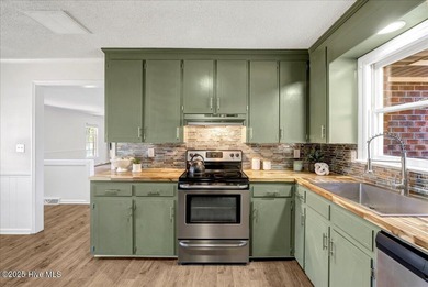 This isn't your average brick ranch - it's a beautifully on Falling Creek Country Club in North Carolina - for sale on GolfHomes.com, golf home, golf lot