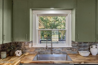 This isn't your average brick ranch - it's a beautifully on Falling Creek Country Club in North Carolina - for sale on GolfHomes.com, golf home, golf lot