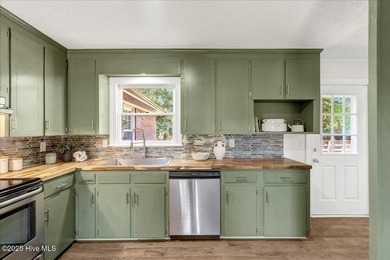 This isn't your average brick ranch - it's a beautifully on Falling Creek Country Club in North Carolina - for sale on GolfHomes.com, golf home, golf lot