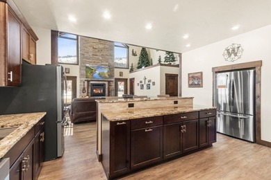 QUALITY BUILT CUSTOM HOME CLOSE TO TAMARACK! Views all around on Osprey Meadows at Tamarack Resort in Idaho - for sale on GolfHomes.com, golf home, golf lot