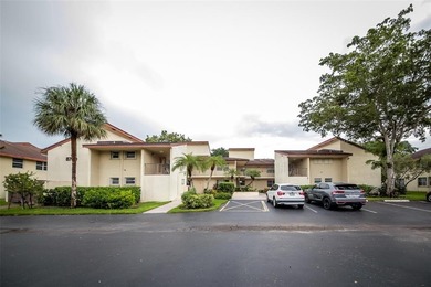Spacious 2-Bedroom, 2-Bath Unit with Serene Golf Course Views! on Woodmont Country Club in Florida - for sale on GolfHomes.com, golf home, golf lot