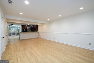 Enjoy being minutes from everything Sandy Springs has to offer on Steel Canyon Golf Club in Georgia - for sale on GolfHomes.com, golf home, golf lot