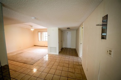 Spacious 2-Bedroom, 2-Bath Unit with Serene Golf Course Views! on Woodmont Country Club in Florida - for sale on GolfHomes.com, golf home, golf lot