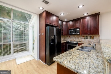 Enjoy being minutes from everything Sandy Springs has to offer on Steel Canyon Golf Club in Georgia - for sale on GolfHomes.com, golf home, golf lot