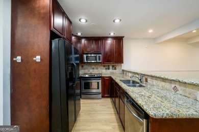 Enjoy being minutes from everything Sandy Springs has to offer on Steel Canyon Golf Club in Georgia - for sale on GolfHomes.com, golf home, golf lot