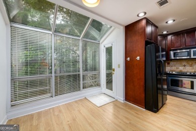 Enjoy being minutes from everything Sandy Springs has to offer on Steel Canyon Golf Club in Georgia - for sale on GolfHomes.com, golf home, golf lot