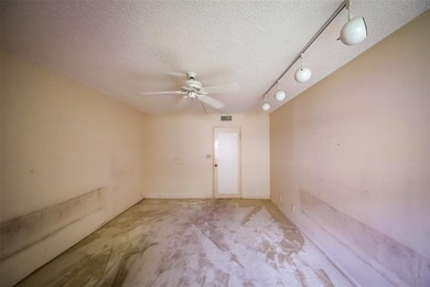 Spacious 2-Bedroom, 2-Bath Unit with Serene Golf Course Views! on Woodmont Country Club in Florida - for sale on GolfHomes.com, golf home, golf lot