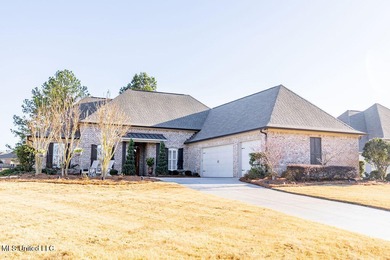 You Will Find This Seamless And Exquisite 4 Bedroom 3.5 Bath on Lake Caroline Golf Club in Mississippi - for sale on GolfHomes.com, golf home, golf lot