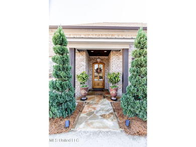 You Will Find This Seamless And Exquisite 4 Bedroom 3.5 Bath on Lake Caroline Golf Club in Mississippi - for sale on GolfHomes.com, golf home, golf lot