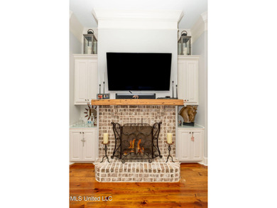 You Will Find This Seamless And Exquisite 4 Bedroom 3.5 Bath on Lake Caroline Golf Club in Mississippi - for sale on GolfHomes.com, golf home, golf lot