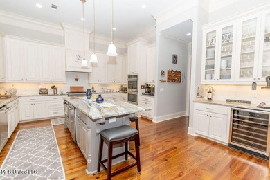 You Will Find This Seamless And Exquisite 4 Bedroom 3.5 Bath on Lake Caroline Golf Club in Mississippi - for sale on GolfHomes.com, golf home, golf lot